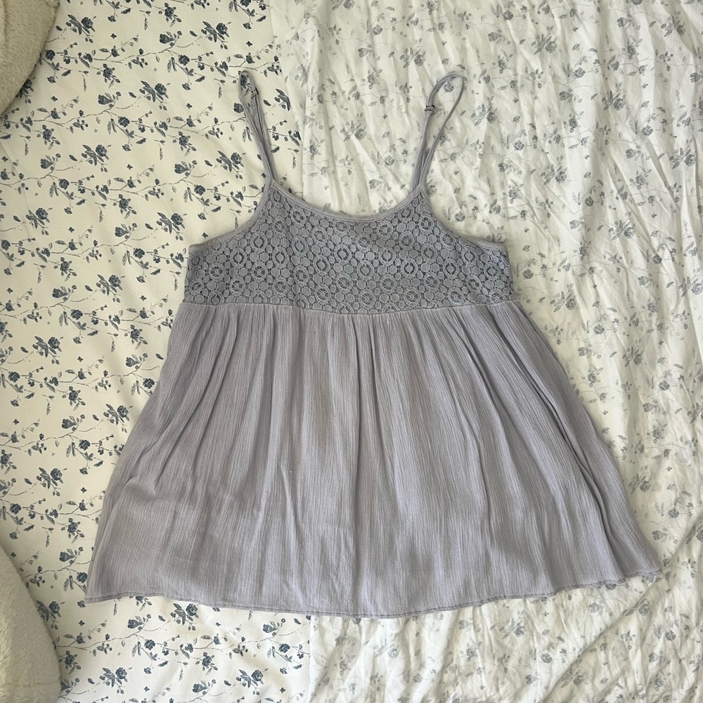 Periwinkle blue colored, youth girls flowy tank top